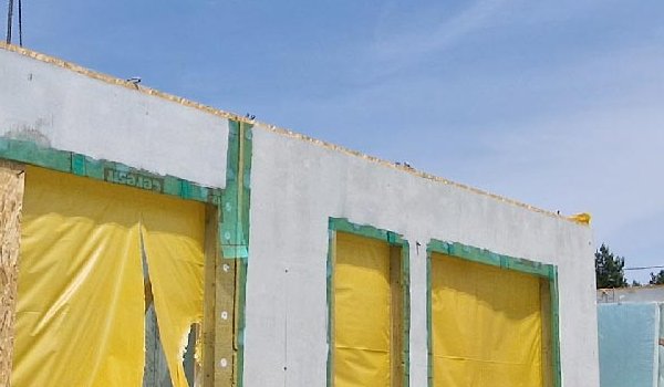 Photo de la réalisation Construction de deux maisons jumelles en ossature bois destiné à la location.