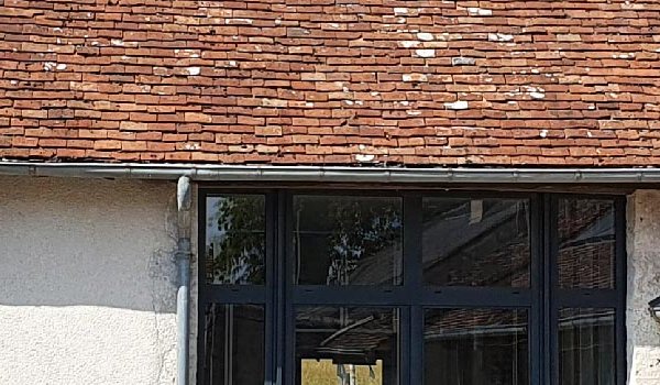 Photo de la réalisation Vue intérieure d'une réhabilitation d'une ancienne dépendance en (…)