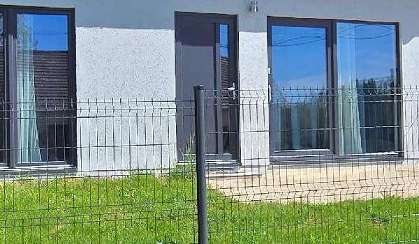 Photo de la réalisation Construction de deux maisons jumelles en ossature bois destiné à la location.